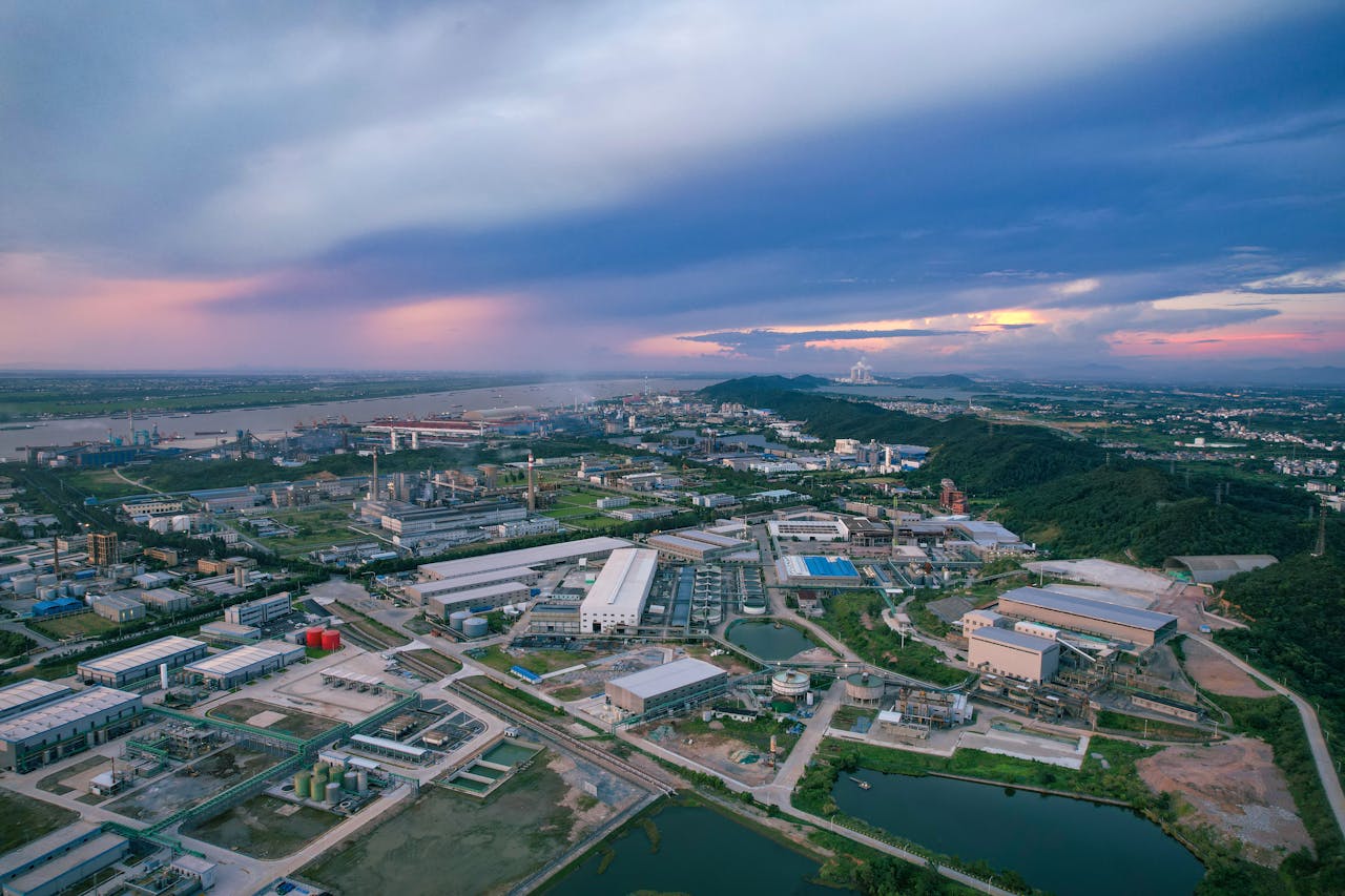 Home A stunning aerial view of an industrial area at sunset in Jiujiang, China.